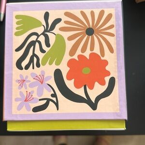 NWOT 4 abstract floral puzzles in box. Great gift giving option.